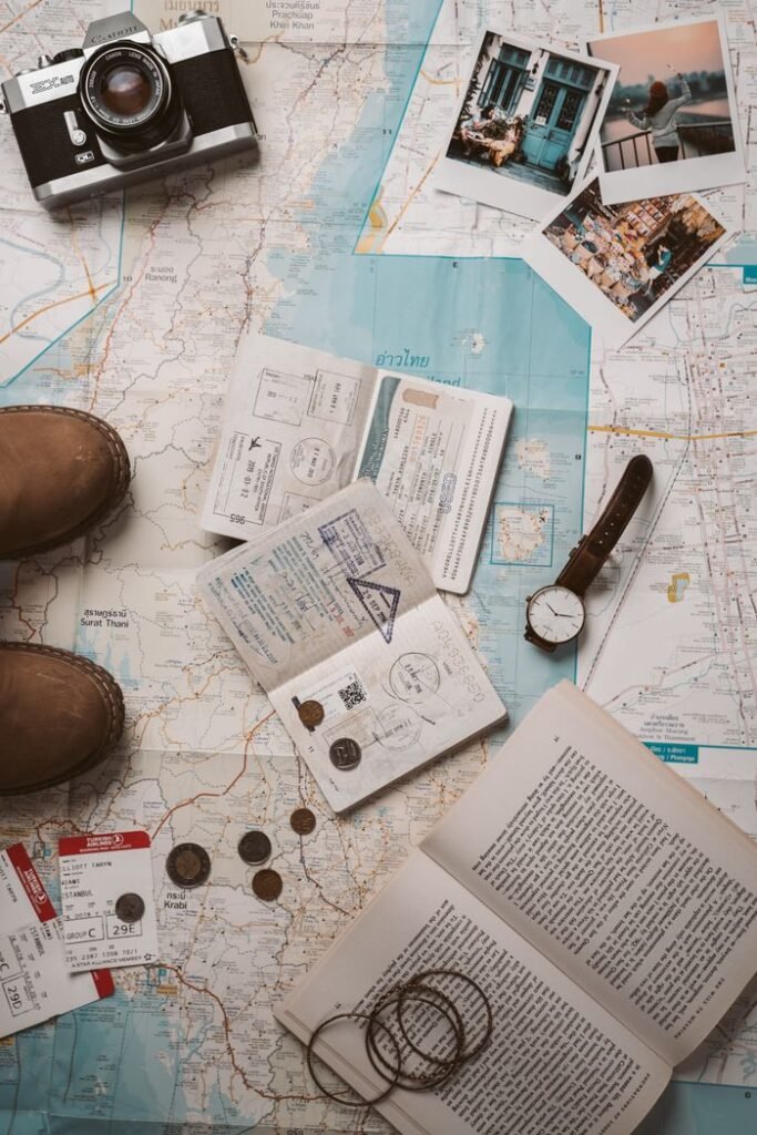 Crafting Captivating Headlines: Your awesome post title goes here Flat lay of travel essentials featuring a map, camera, and passport stamps, perfect for wanderlust inspiration.
